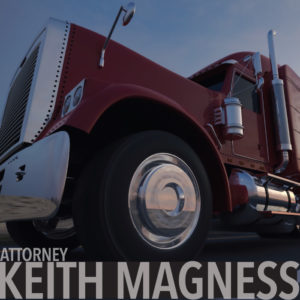 close-up of 18-wheeler truck tractor with text at bottom: attorney Keith Magness